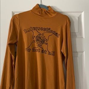 “intersectional or not at all” turtle neck